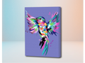 Lienzo con pintura de colibrí multicolor sobre fondo morado en estilo pintura por números.